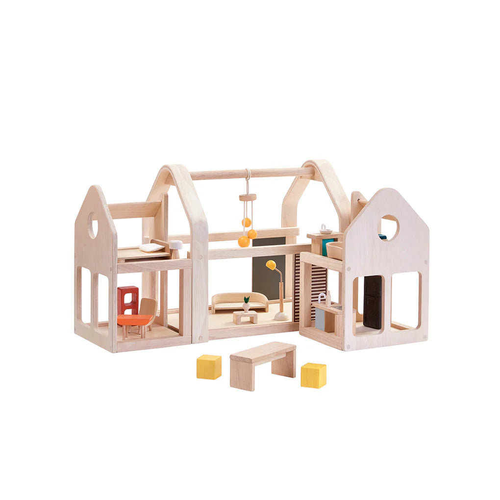 Plan Toys Slide N Go Dollhouse